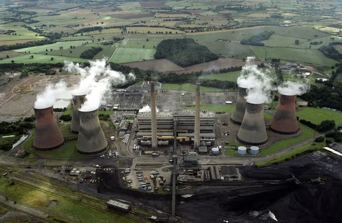 Aerial view of Drakelow Power Station while operational, showing six cooling towers, twin chimneys and surrounding countryside